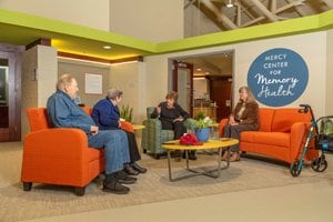 People sitting outside the Center for Memory Health