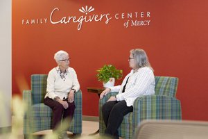 Women sitting together at the Family Caregivers Center of Mercy